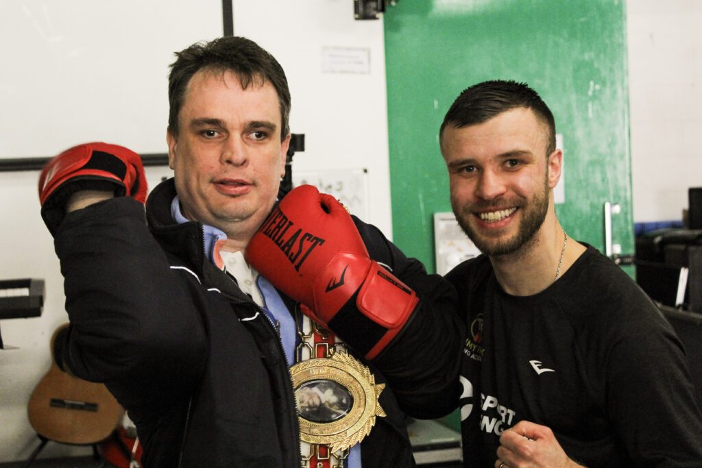 Man with learning disability with Sheffield boxing star Tommy Frank