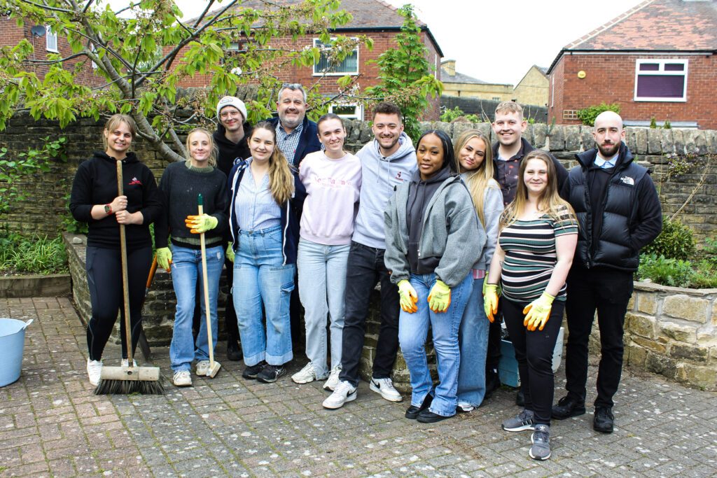Group of Nandos employees helping out Burton Street Foundation in Sheffield as part of community programme