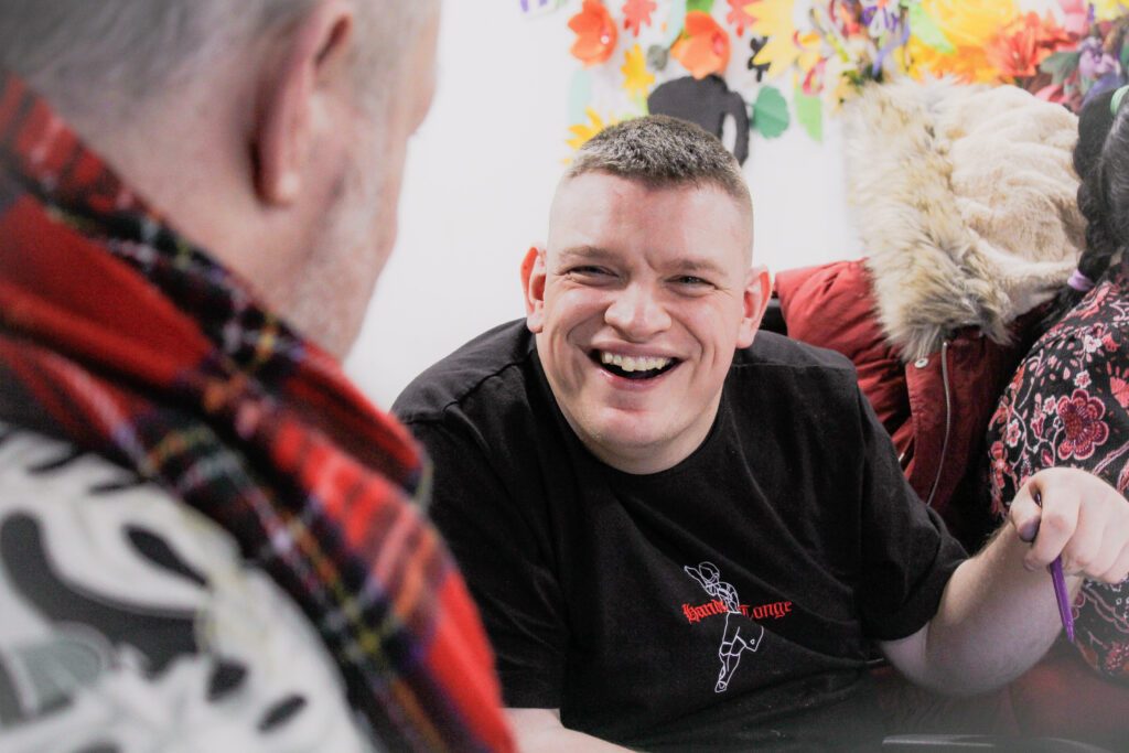 Adult with learning disability in art session at Burton Street Foundation in Sheffield
